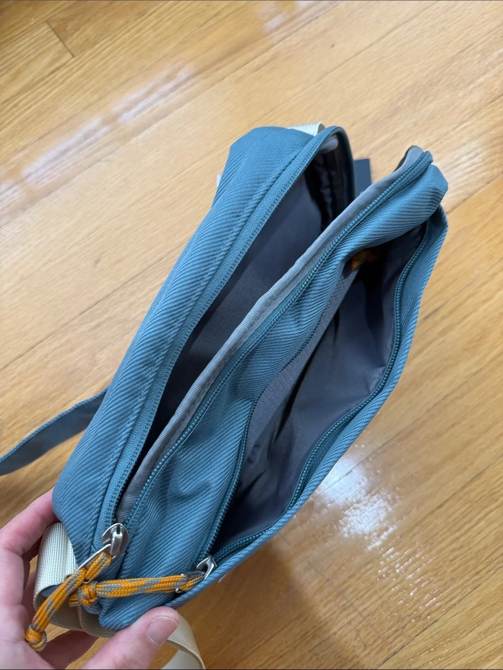 The North Face Teal Sling Bag with Cream Strap New with Tags